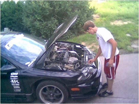 Will working on his Eclipse as a kid